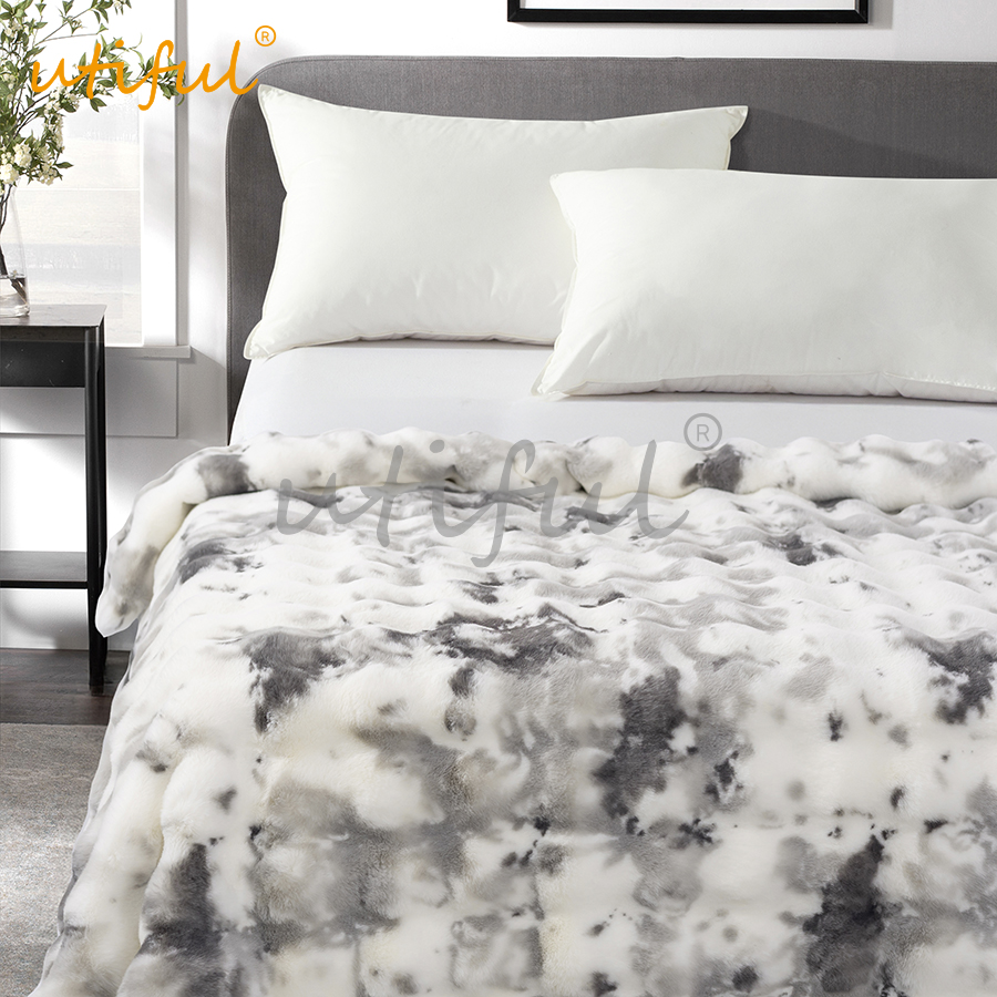 Printed faux fur throw blanket